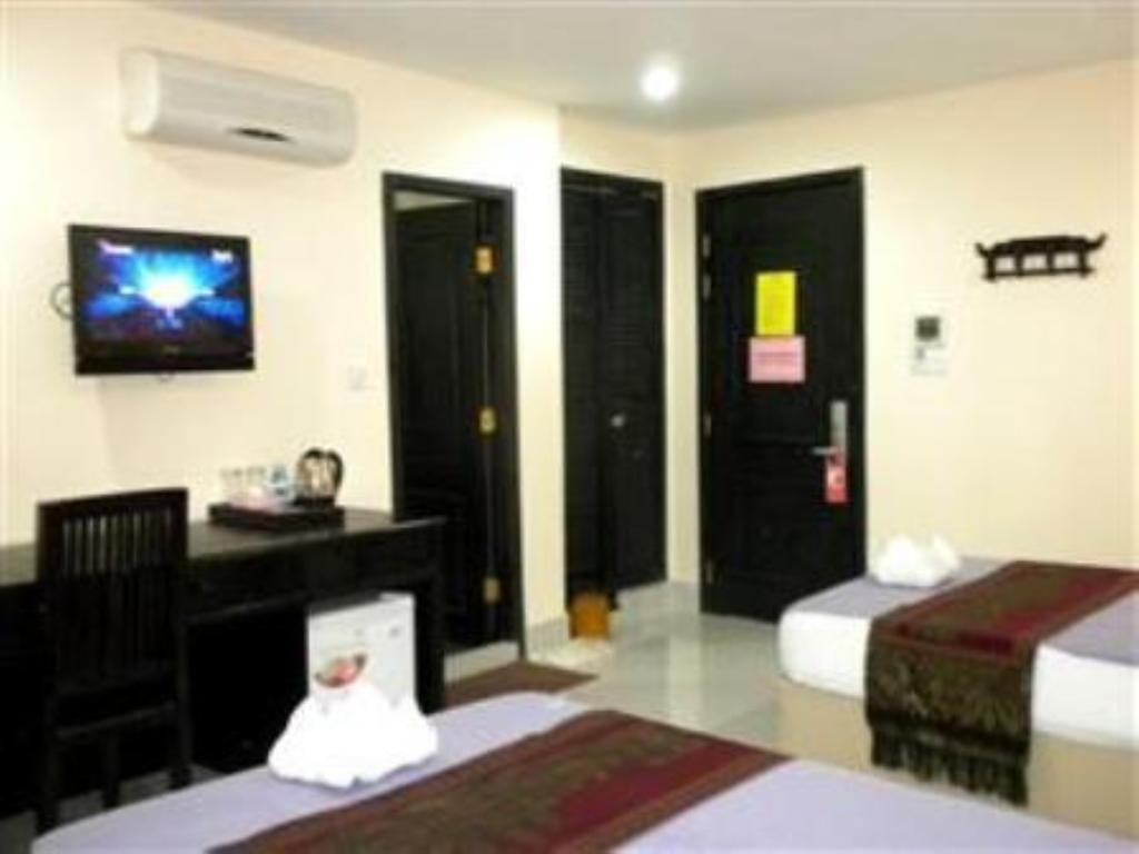 China Town Guesthouse Phnom Penh Quarto foto